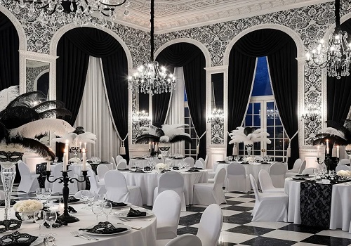 Black and white theme party decor with monochrome balloons and table styling