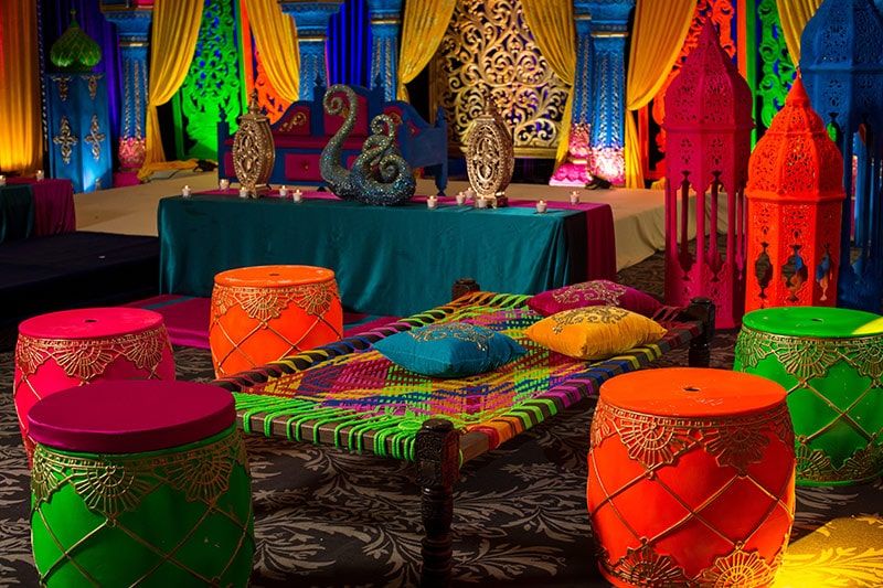 Punjabi theme party with dhol drummers performing at a colourful celebration